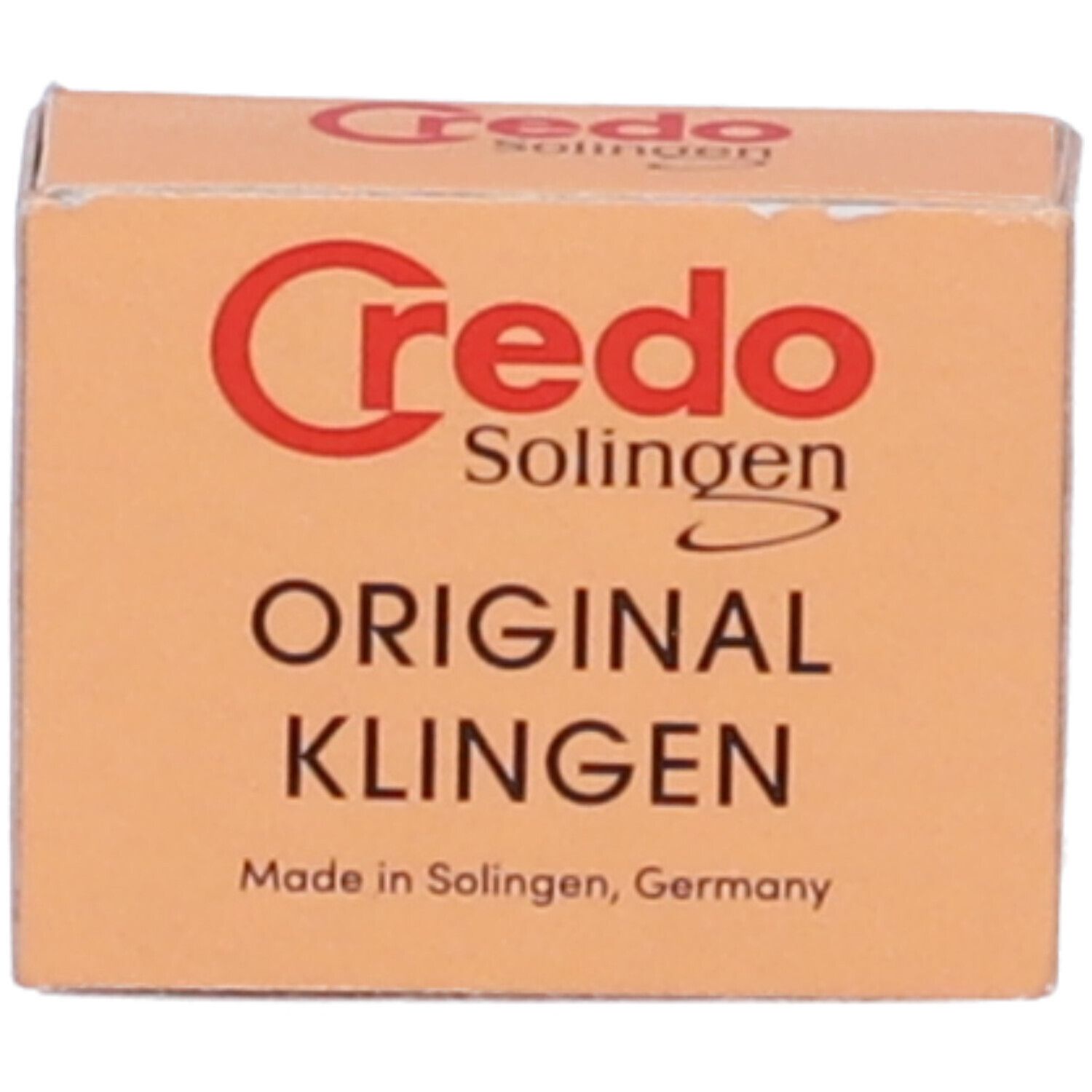 Scatola di cartone beige con logo Credo rosso e scritta "ORIGINAL KLINGEN". Prodotto a Solingen, Germania.