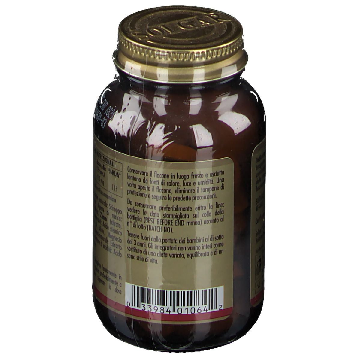 Retro del flacone di vetro marrone. Etichetta con avvertenze e numero di lotto.