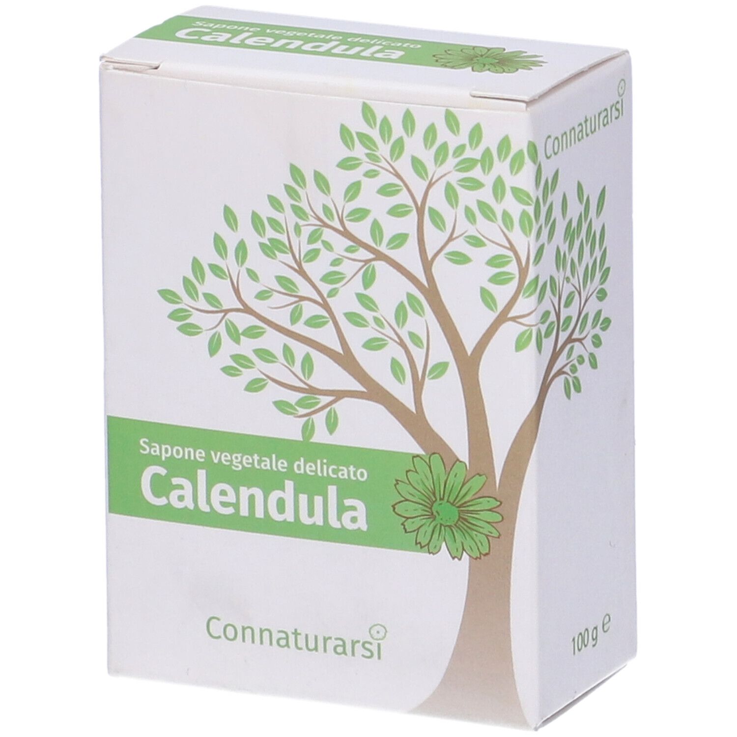 Scatola bianca con disegno di albero verde e testo. "Calendula" in verde. Marchio: Connaturarsi. Scritta: "Sapone vegetale delicato".