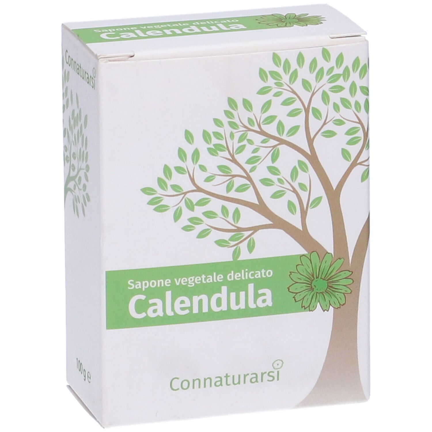 Scatola bianca con disegno di albero verde e testo. "Calendula" in verde. Marchio: Connaturarsi. Scritta: "Sapone vegetale delicato".