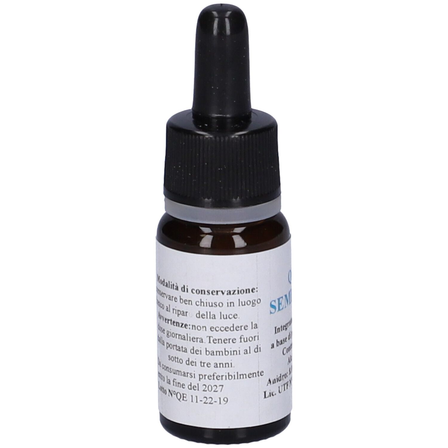 Flacone di vetro marrone con tappo nero ed etichetta. Scritta: QE 19 SEMI CALDI. Contiene 10 ml. Testo sul retro.