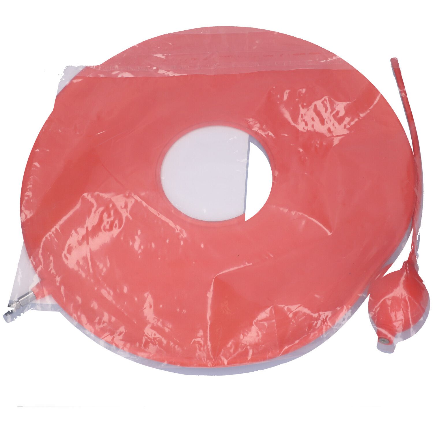 Anello in gomma rosso con pompa, confezionato. Foro centrale.