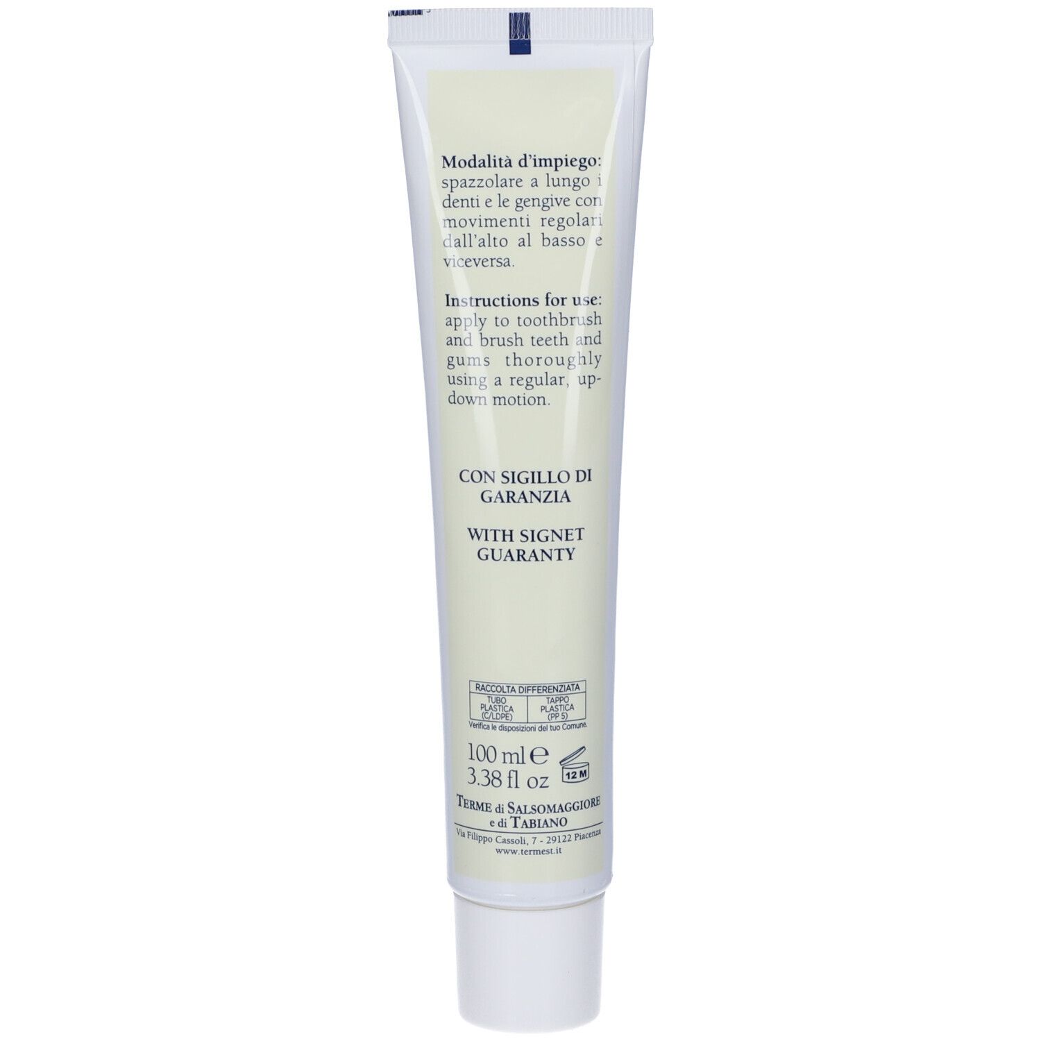 Retro del tubo di dentifricio. Testo: istruzioni per l'uso, ingredienti, 100 ml, sigillo.