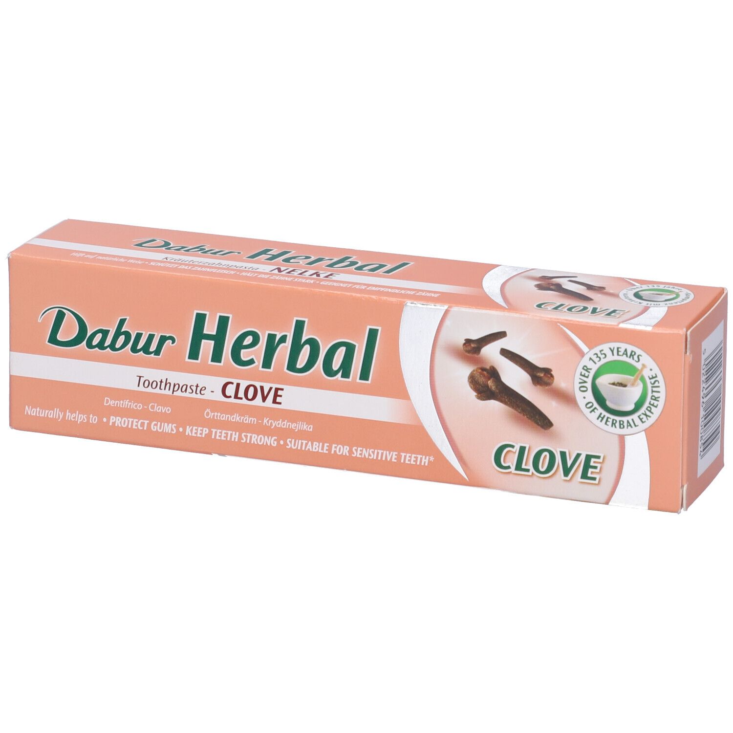 Confezione di dentifricio con chiodi di garofano. Testo: Dabur Herbal, Clove. Sigillo verde: 125 anni di esperienza erboristica. Vista prospettica.