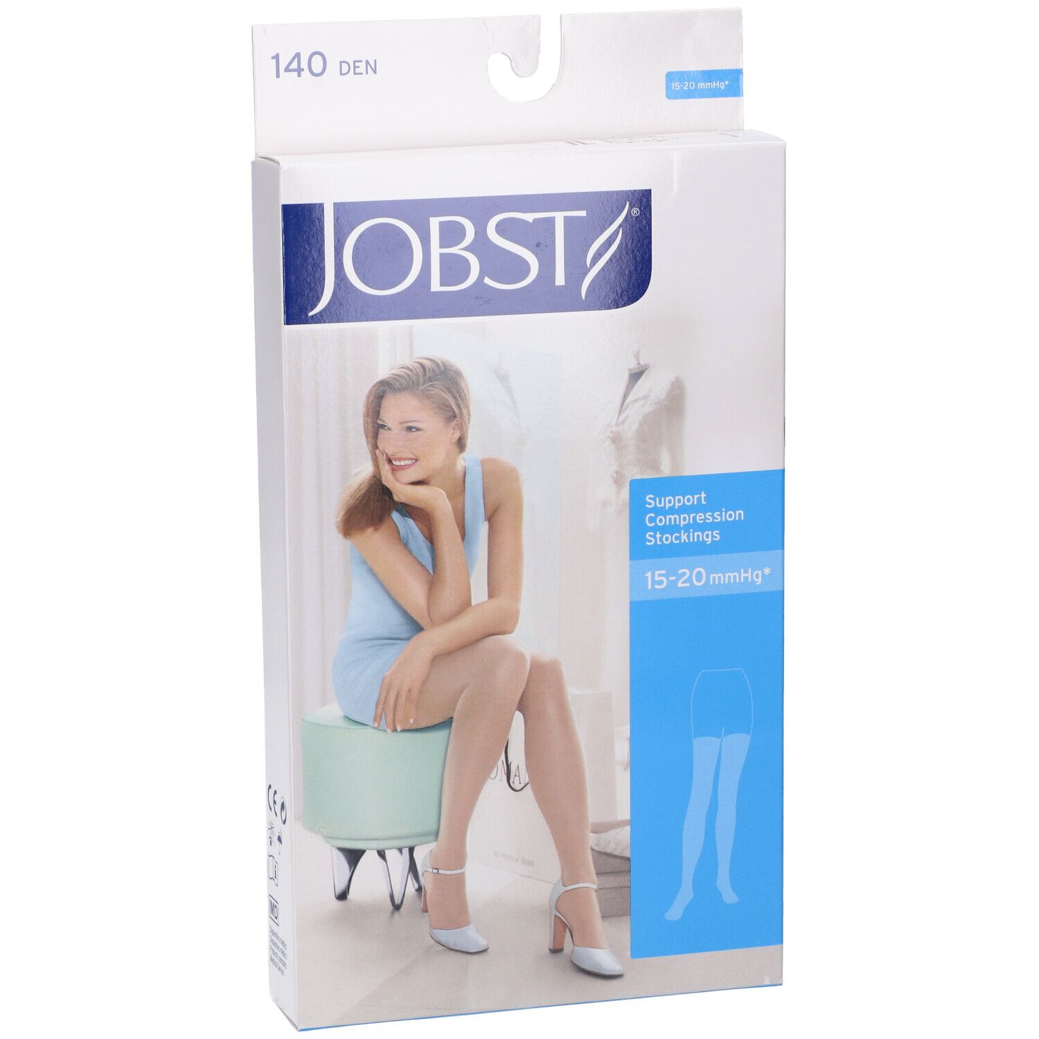 Calze a compressione Jobst in confezione. 140 DEN. Scritta: 15-20 mmHg. Donna con calze.
