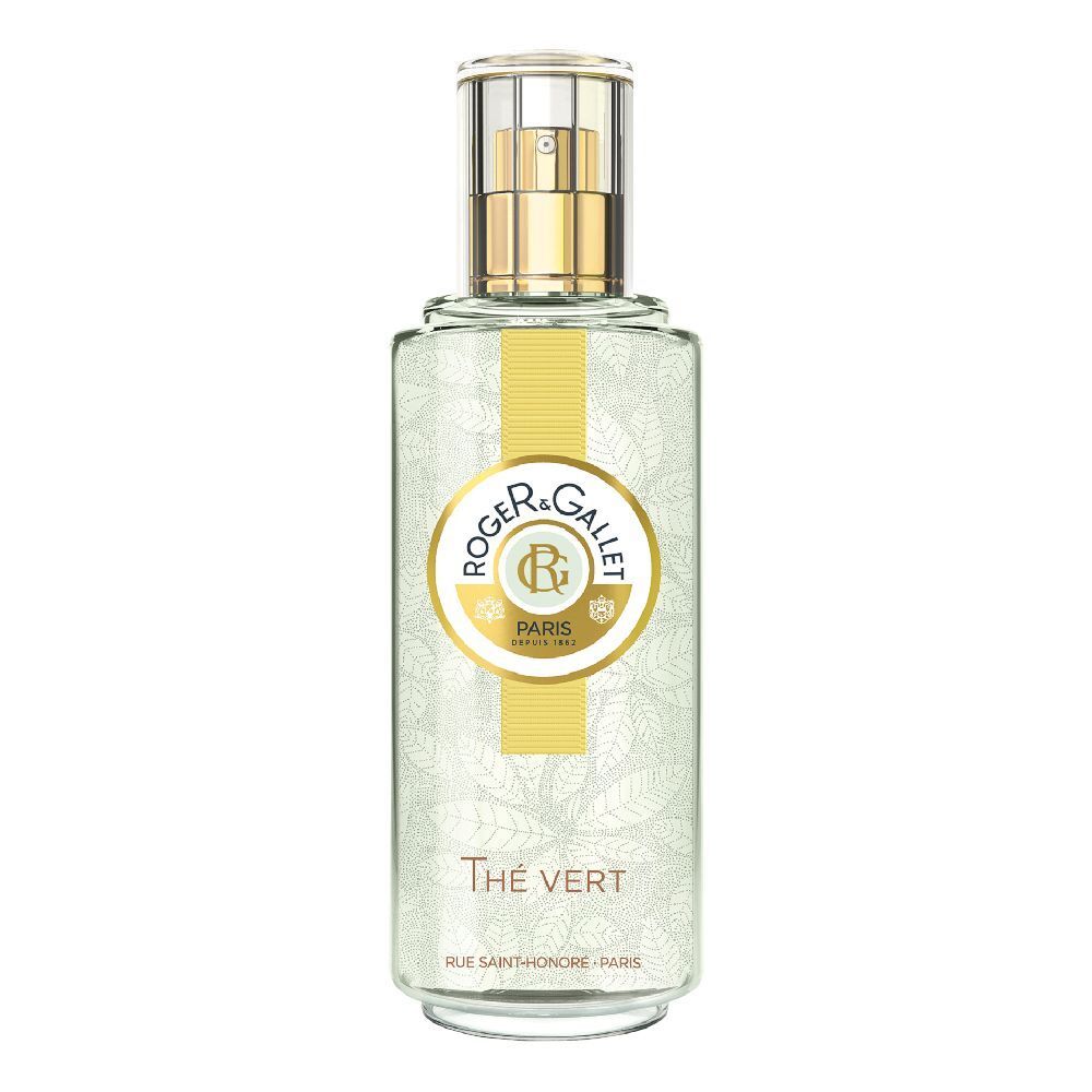 Flacone trasparente con vaporizzatore dorato. Logo e scritta sull'etichetta. Profumo Thé Vert.