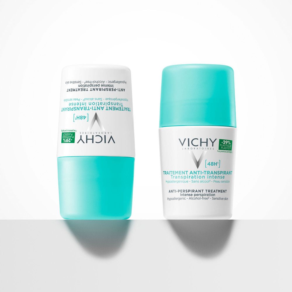 Due deodoranti Roll-On Vichy, uno capovolto. Tappi turchino.