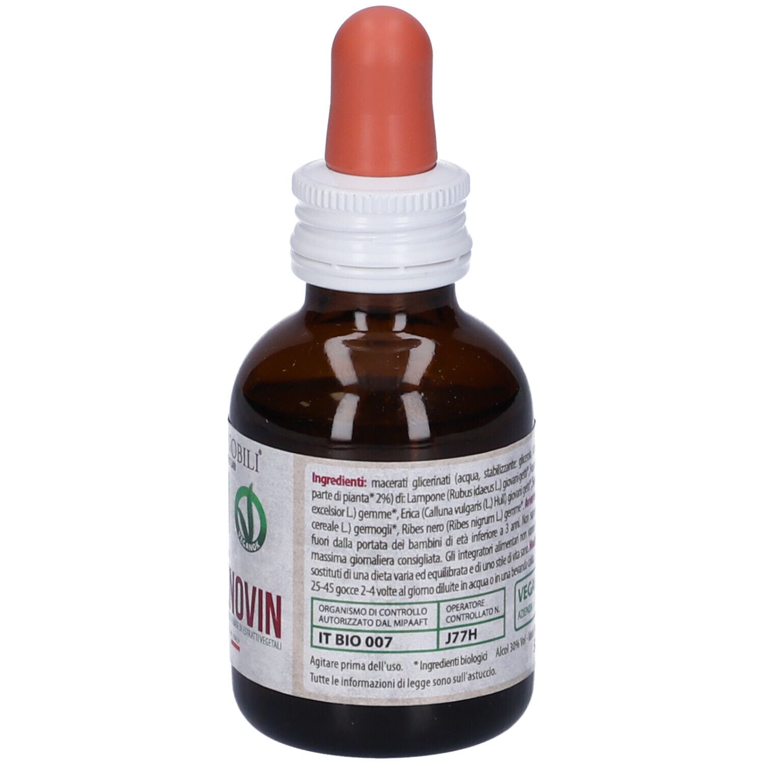 Flacone di vetro marrone con contagocce. Etichetta con testo e 'Dismenovin'.