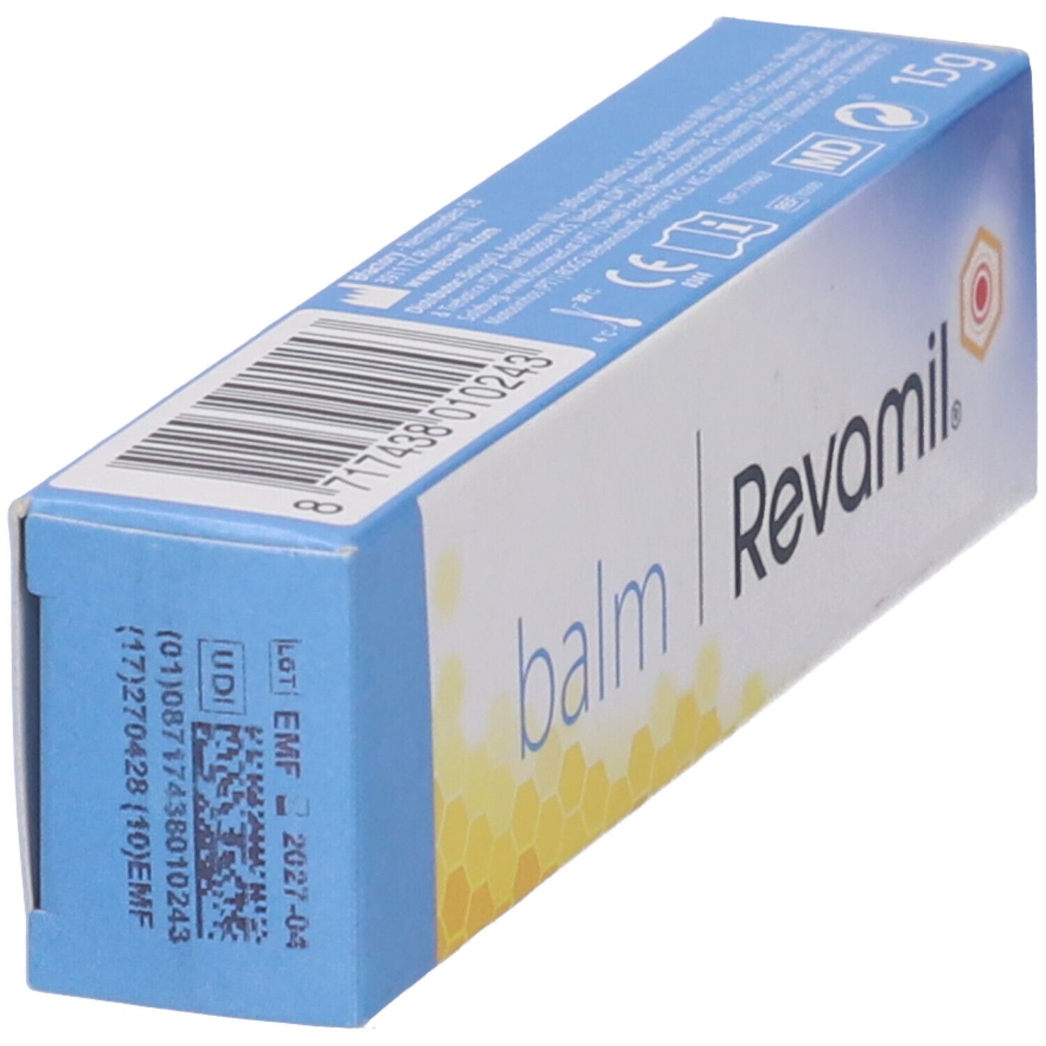 Confezione inclinata Revamil Balm. Testo: balm, Revamil, 15g. Codice e codice a barre.