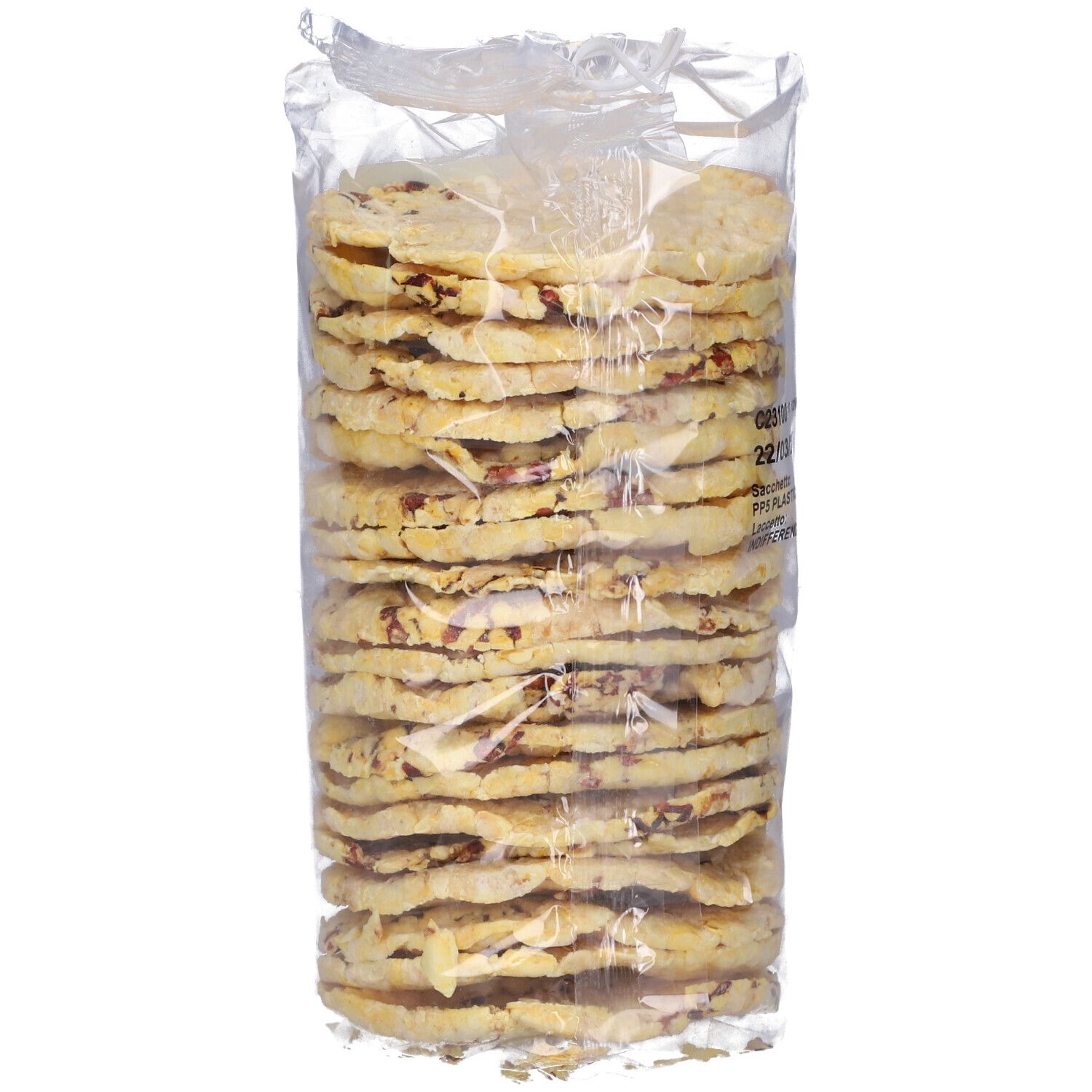 Confezione trasparente di gallette di mais. Pila di gallette rotonde. Trama e colore visibili.