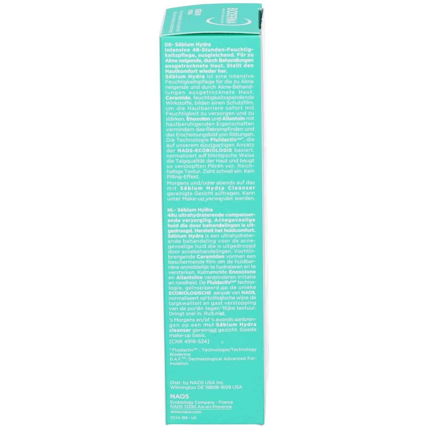 Lato della scatola. Testo multilingue. Contiene informazioni sul prodotto.