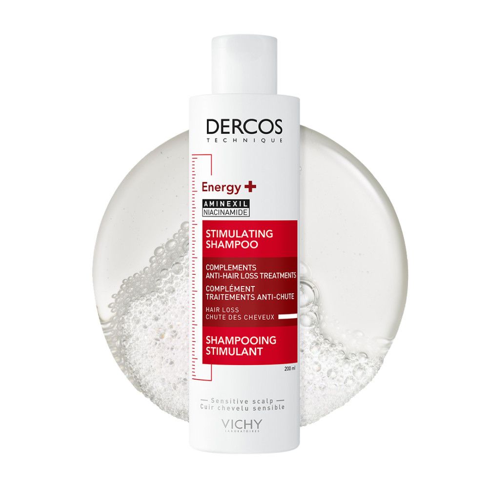 Shampoo Vichy Dercos Energy+ in un liquido trasparente con bollicine.