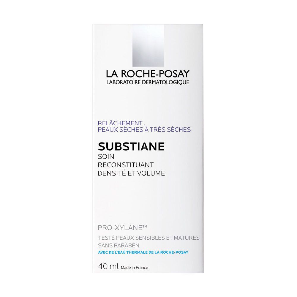 Texture crema. Crema bianca su sfondo bianco. Superficie liscia e lucida. Forma di fiore.