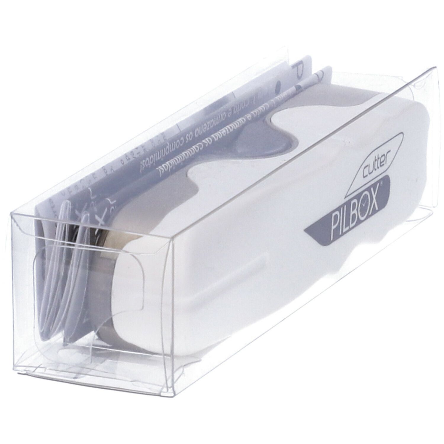 Tagliapillole in confezione trasparente. Corpo bianco, testo grigio. Marchio PILBOX. Con istruzioni.