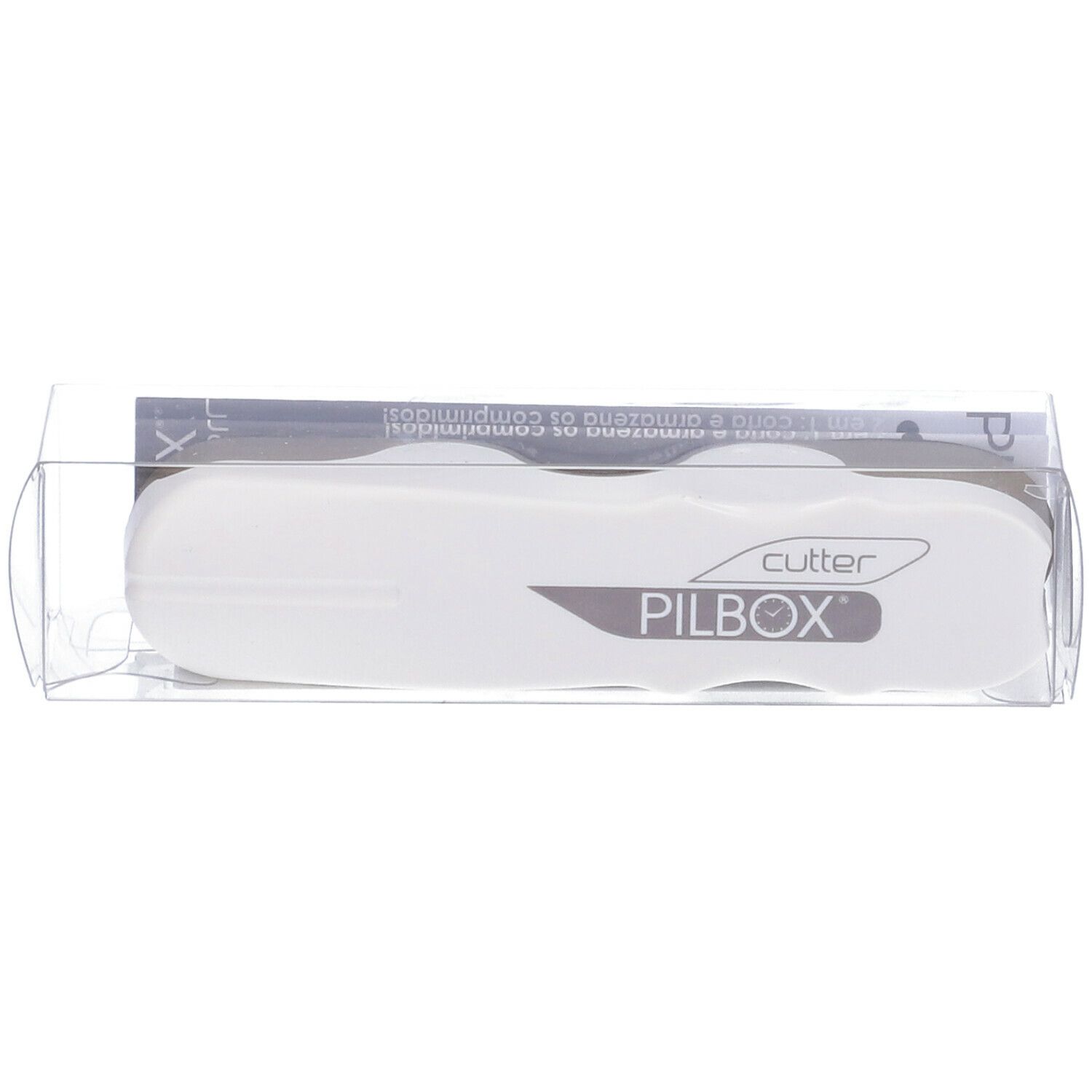 Tagliapillole in confezione trasparente. Corpo bianco, testo grigio. Marchio PILBOX.