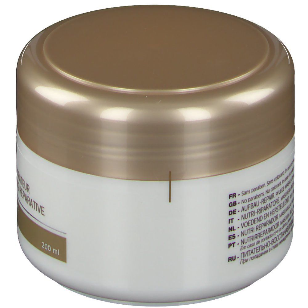 Vaso bianco con coperchio dorato. Scritta: Nutri Réparateur, 200 ml. Testo multilingue.