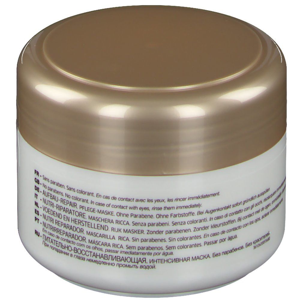 Vaso bianco con coperchio dorato. Testo multilingue. Scritta: Nutri Réparateur, Maschera Rica.