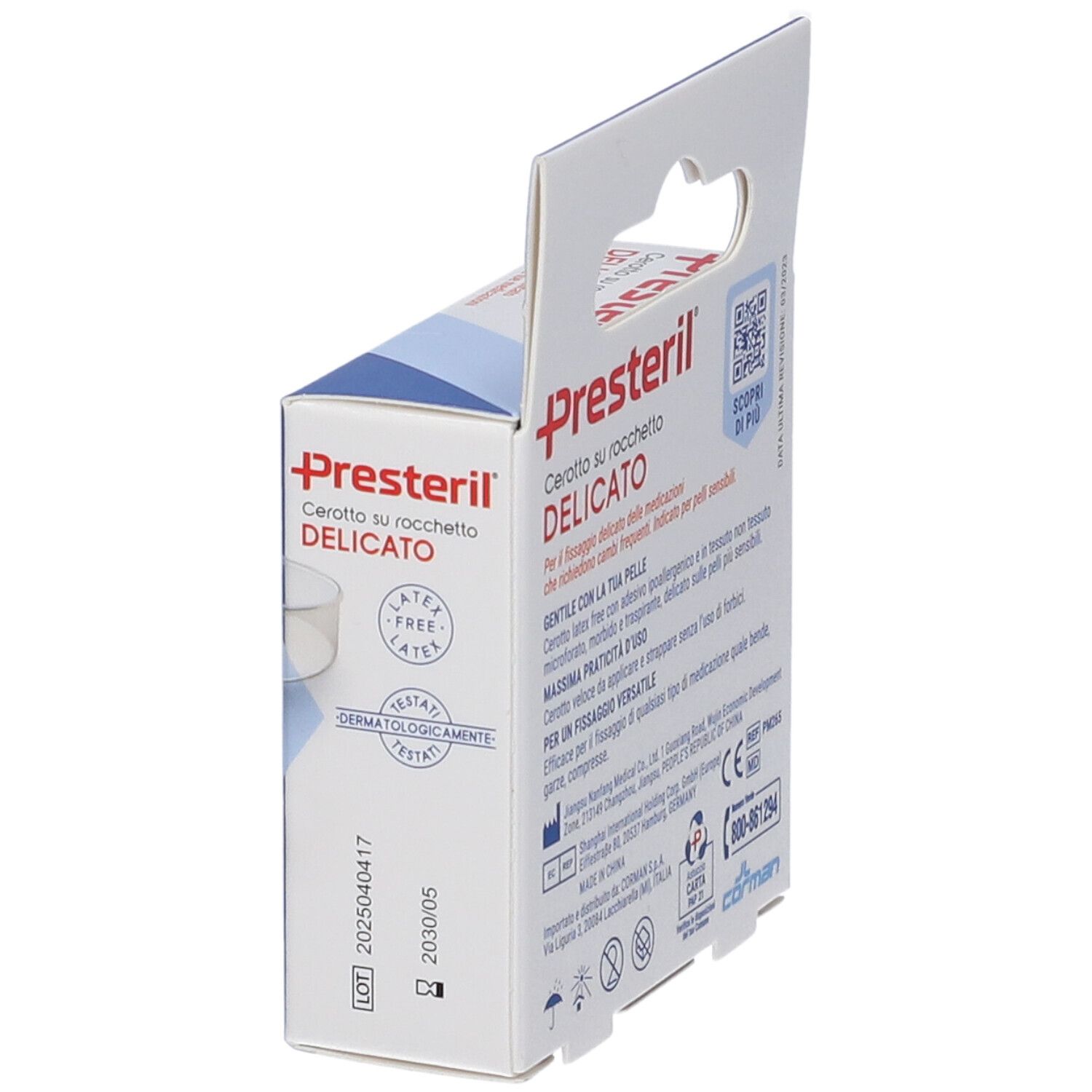 Confezione Presteril Cerotto su Rocchetto. Lato con informazioni prodotto. Rotolo di cerotto visibile. Confezione in cartone con gancio.