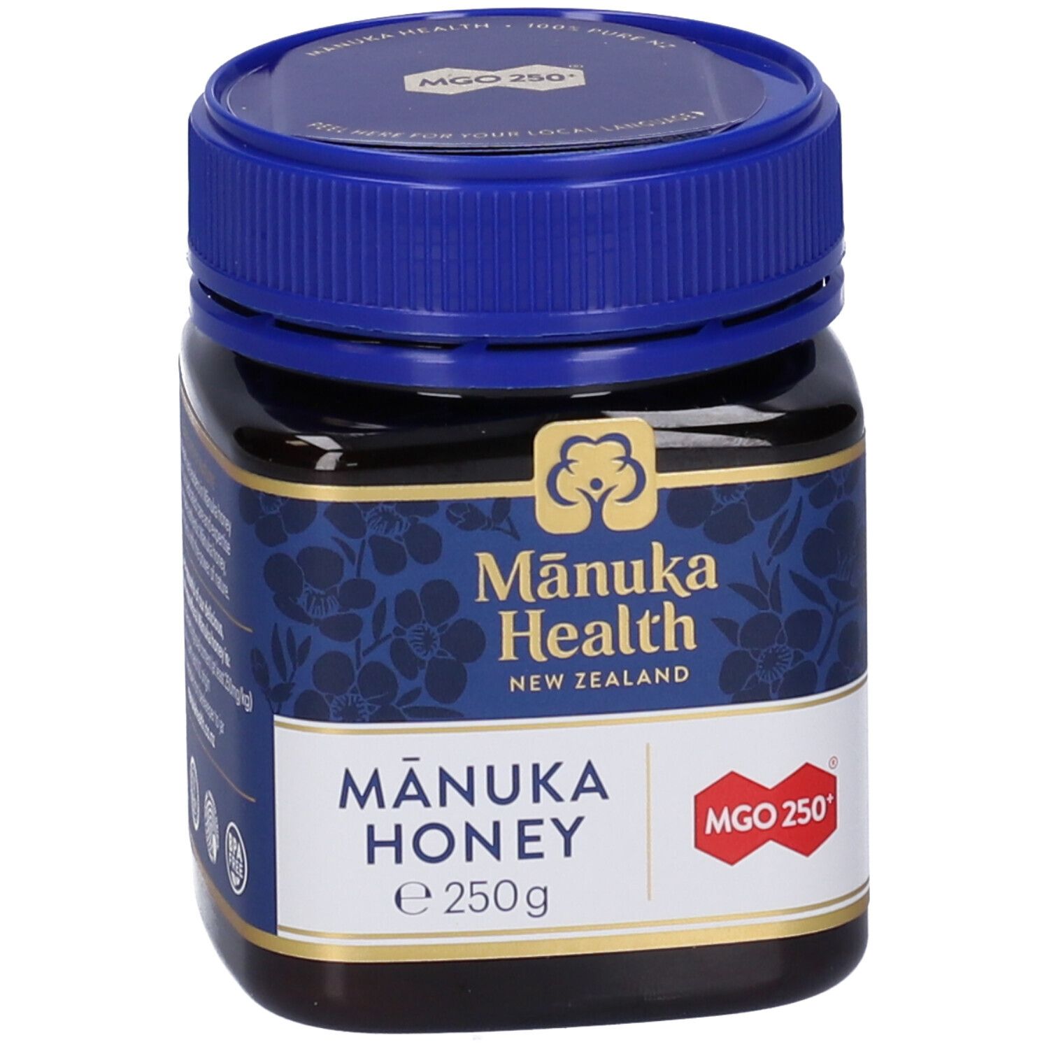 Vasetto di miele di Manuka. Etichetta blu con logo e informazioni. Coperchio blu.