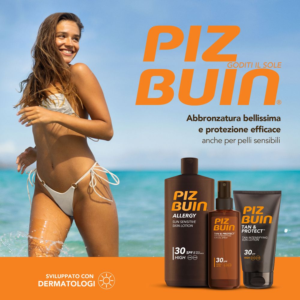 Pubblicità Piz Buin. Donna in spiaggia. Prodotti: lozione, spray, doposole. SPF 30.