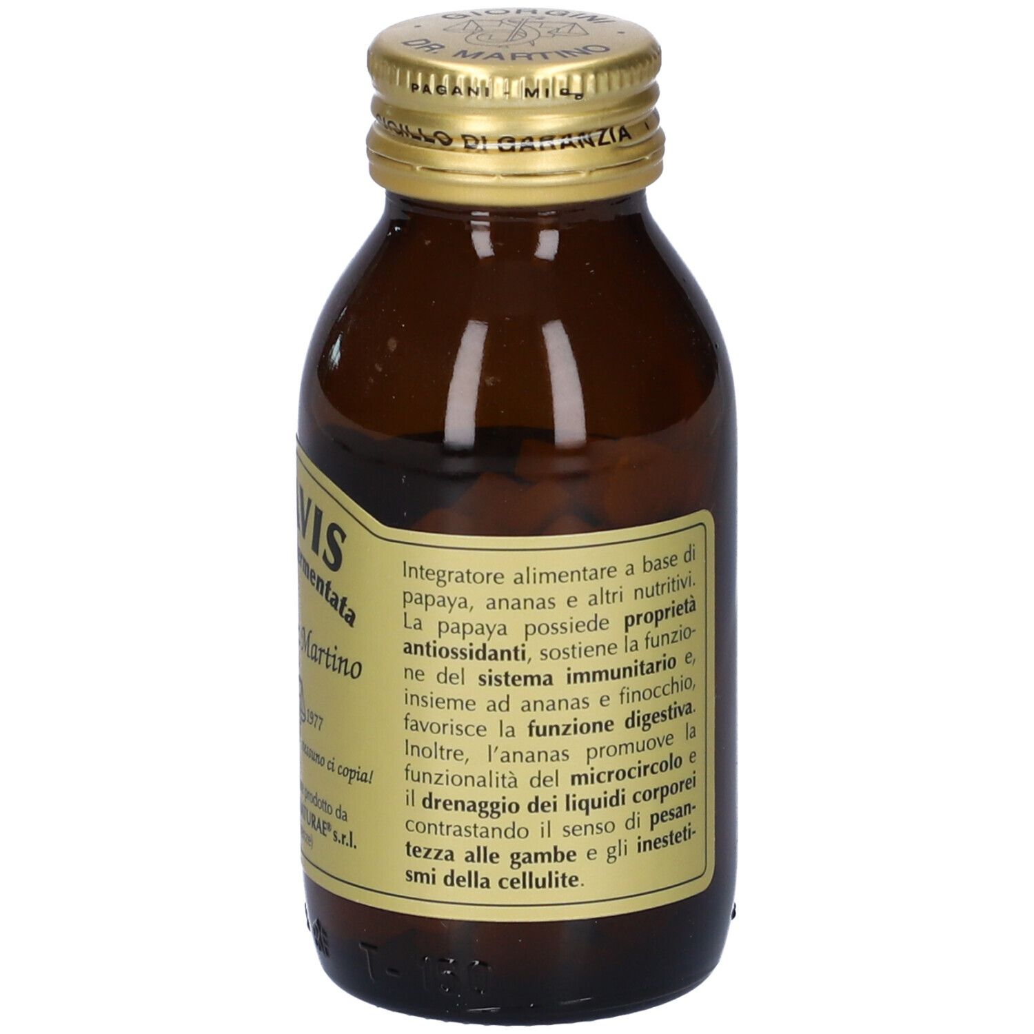 Bottiglia di vetro marrone con tappo dorato. Etichetta con informazioni sul prodotto, ingredienti e dosaggio. Compresse visibili.
