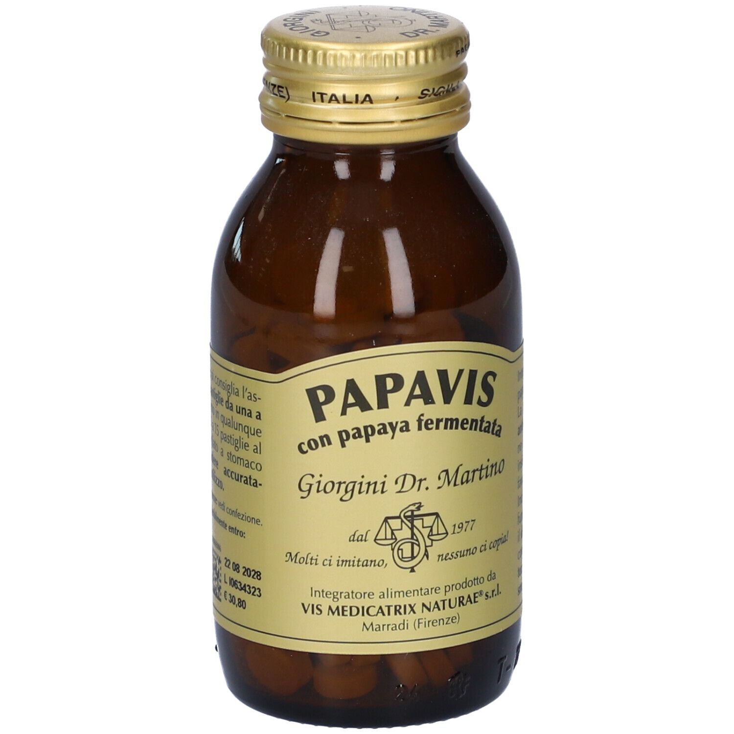 Bottiglia di vetro marrone con tappo dorato. Etichetta con nome del prodotto Papavis, ingredienti e informazioni del produttore. Compresse visibili.