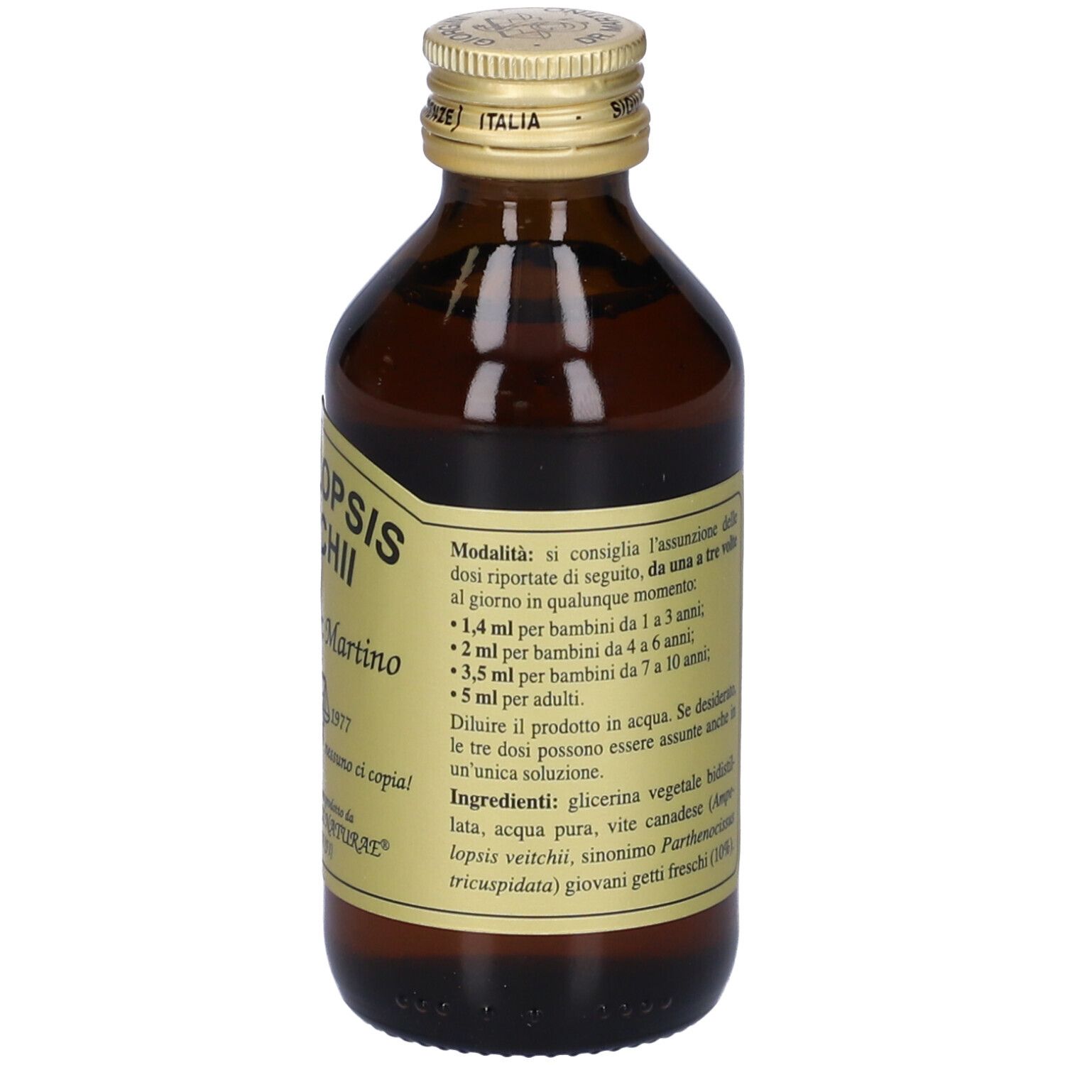 Flacone di vetro marrone con tappo dorato. Etichetta con nome, informazioni produttore e istruzioni per il dosaggio.