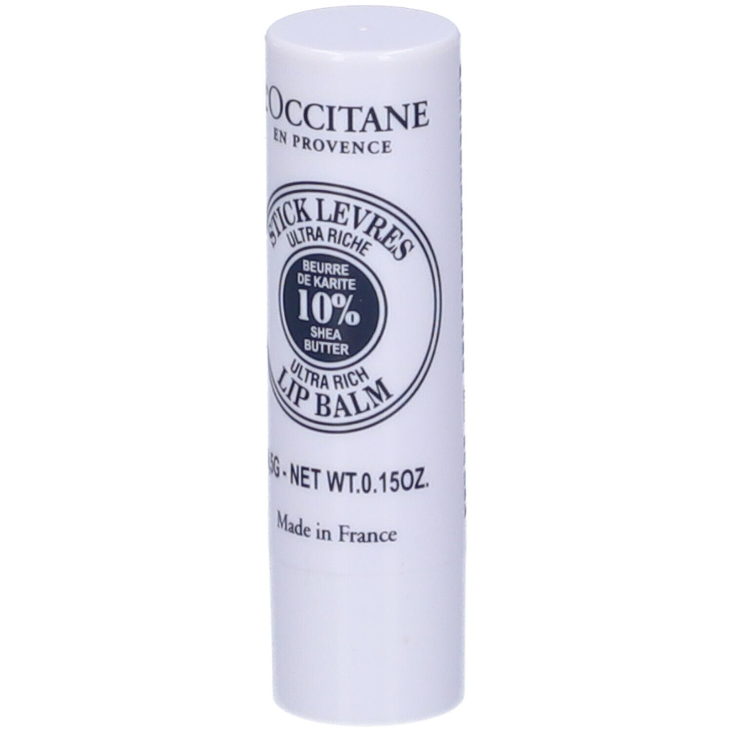 Stick labbra bianco con testo blu. Scritto: Stick Levres Ultra Riche, 10% Burro di Karité, Lip Balm. 4,5g.