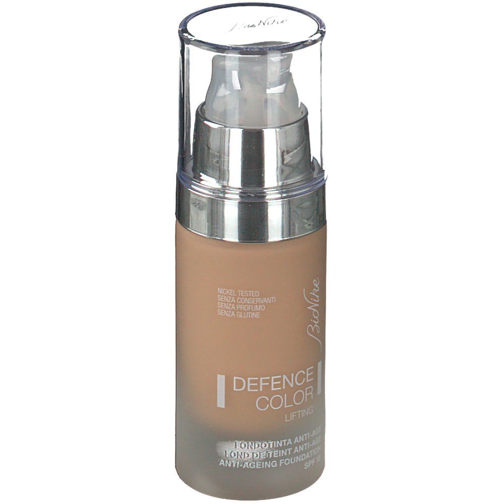 Fondotinta lifting BioNike Defence Color, beige. Flacone in vetro. Dosatore a pompa. Testo.