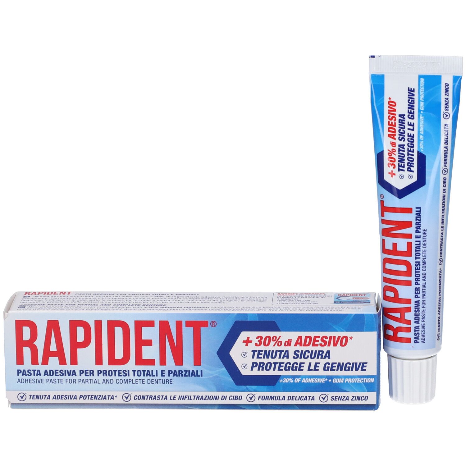 Tubo e scatola pieghevole di crema adesiva Rapident uno accanto all'altro, entrambi con design blu e bianco.