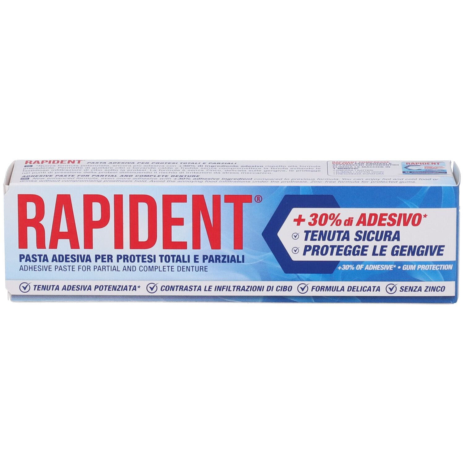 Scatola pieghevole di crema adesiva Rapident con design blu e bianco e informazioni sul prodotto.