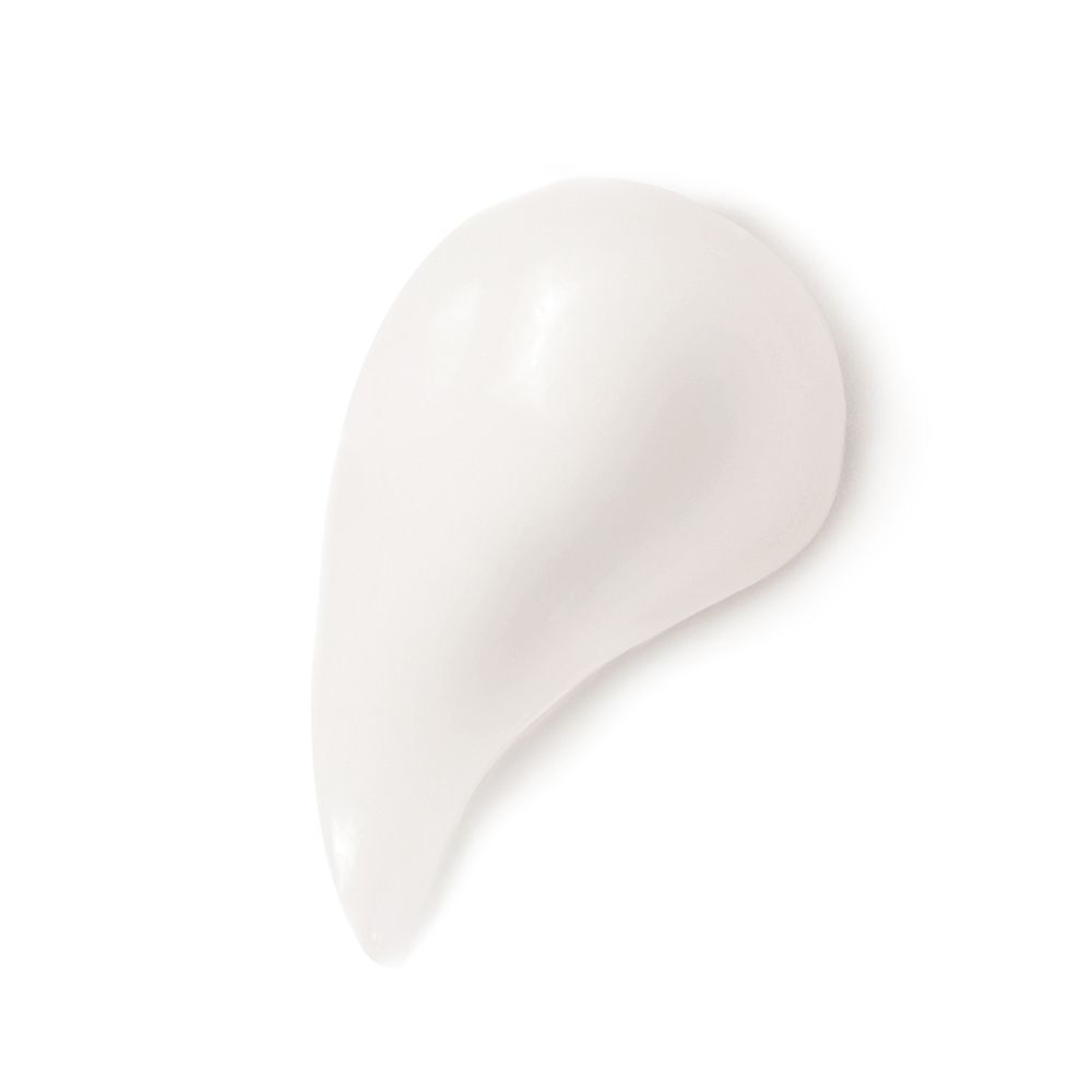 Macchia di crema bianca su sfondo bianco.