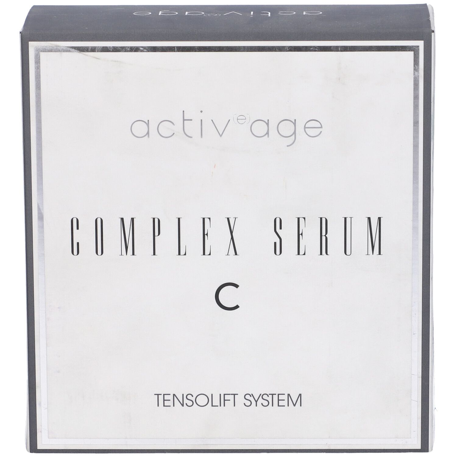 Scatola argentata "activ'age COMPLEX SERUM C". Testo: TENSOLIFT SYSTEM. Coperchio nero con logo.