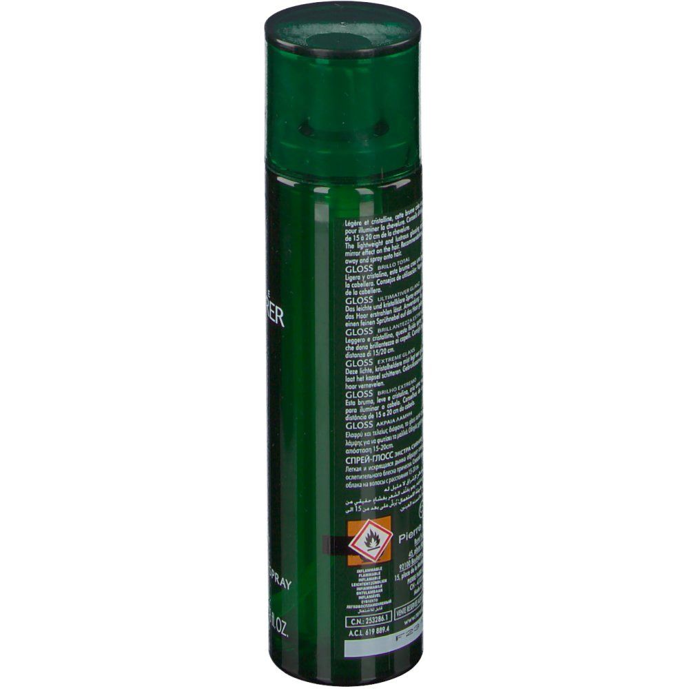 Flacone spray verde. Retro con testo e simboli. Contiene informazioni e avvertenze.