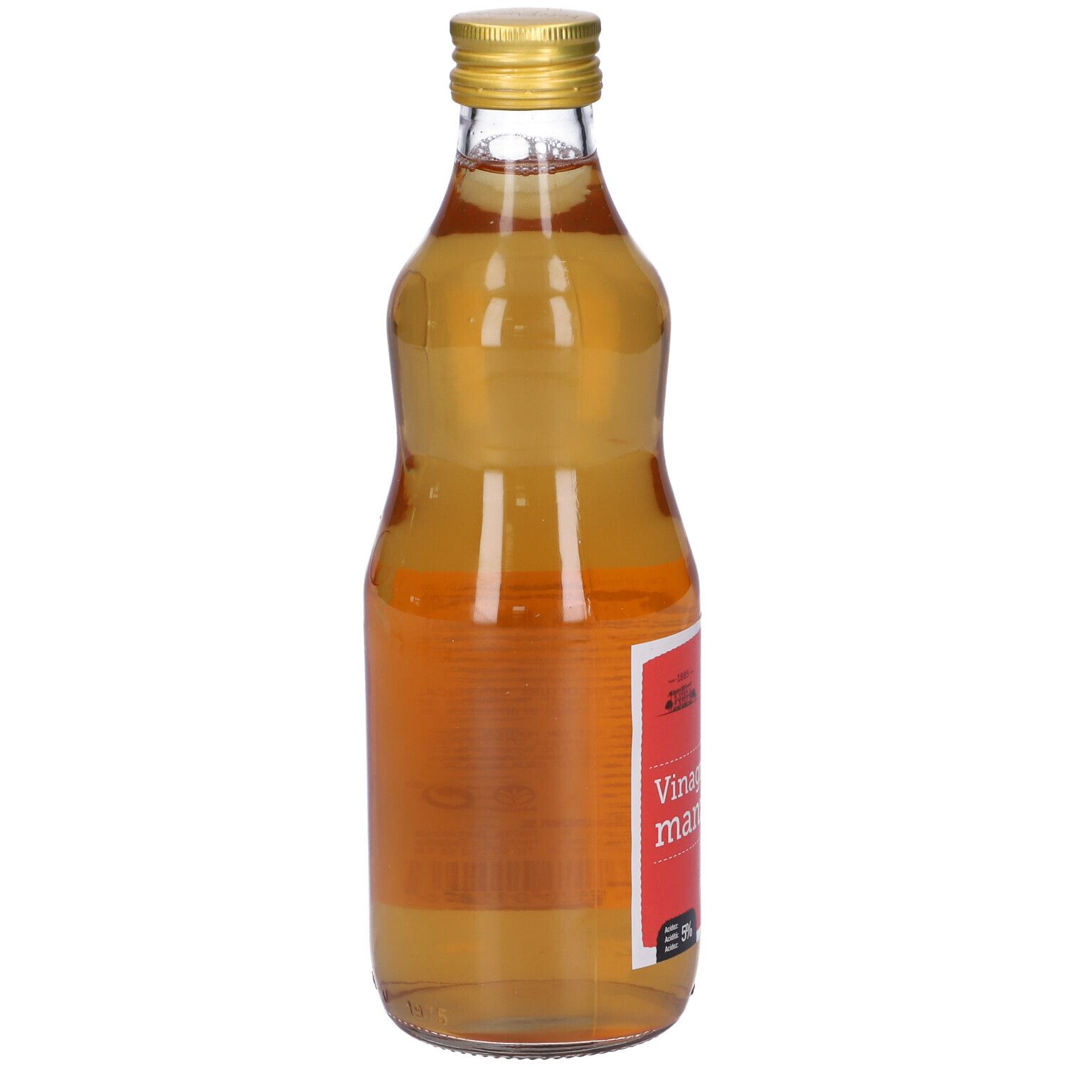 Bottiglia di vetro con liquido giallo. Tappo dorato. Etichetta rossa con testo: Vinagre de manzana.