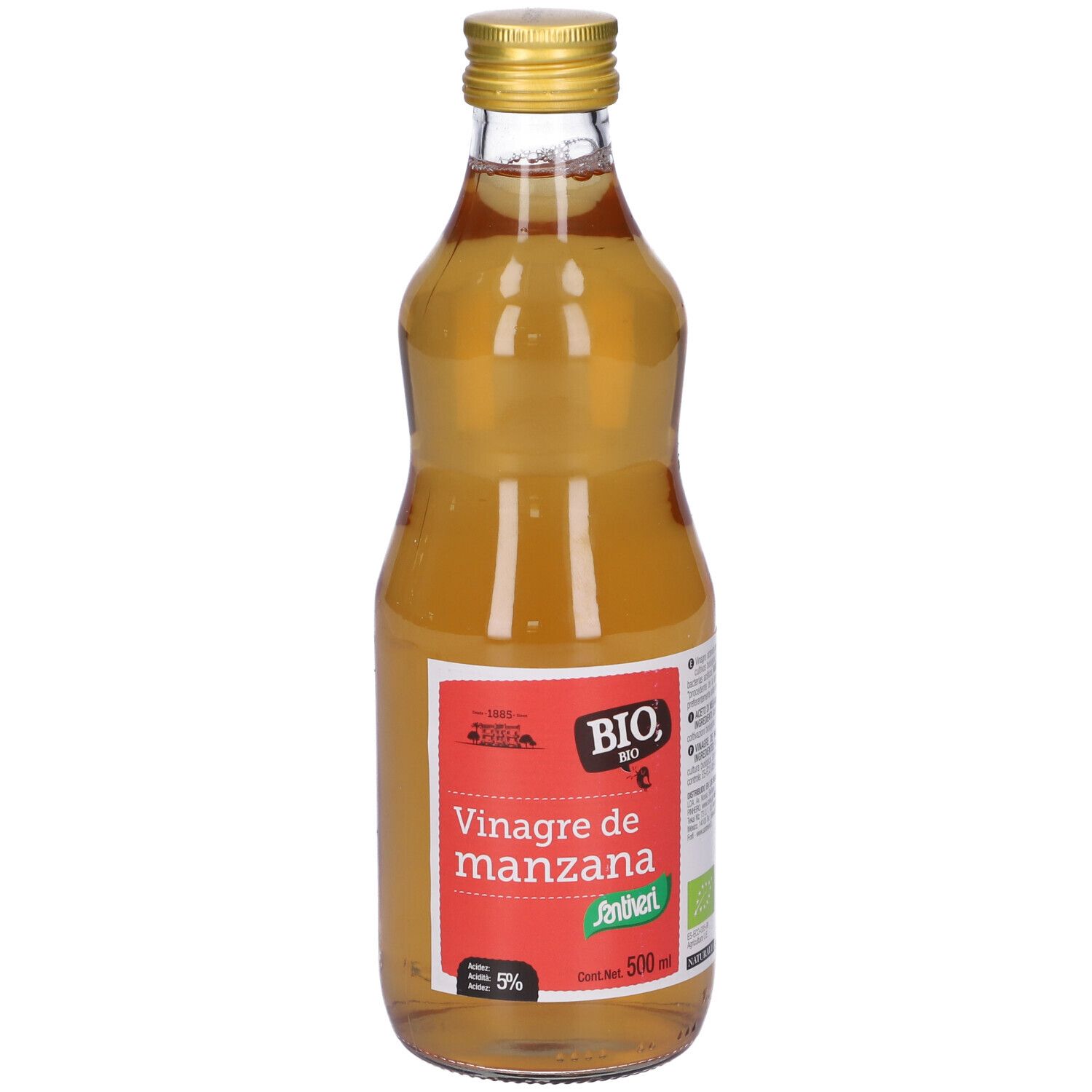 Bottiglia di vetro con liquido giallo. Tappo dorato. Etichetta rossa con testo: Vinagre de manzana.