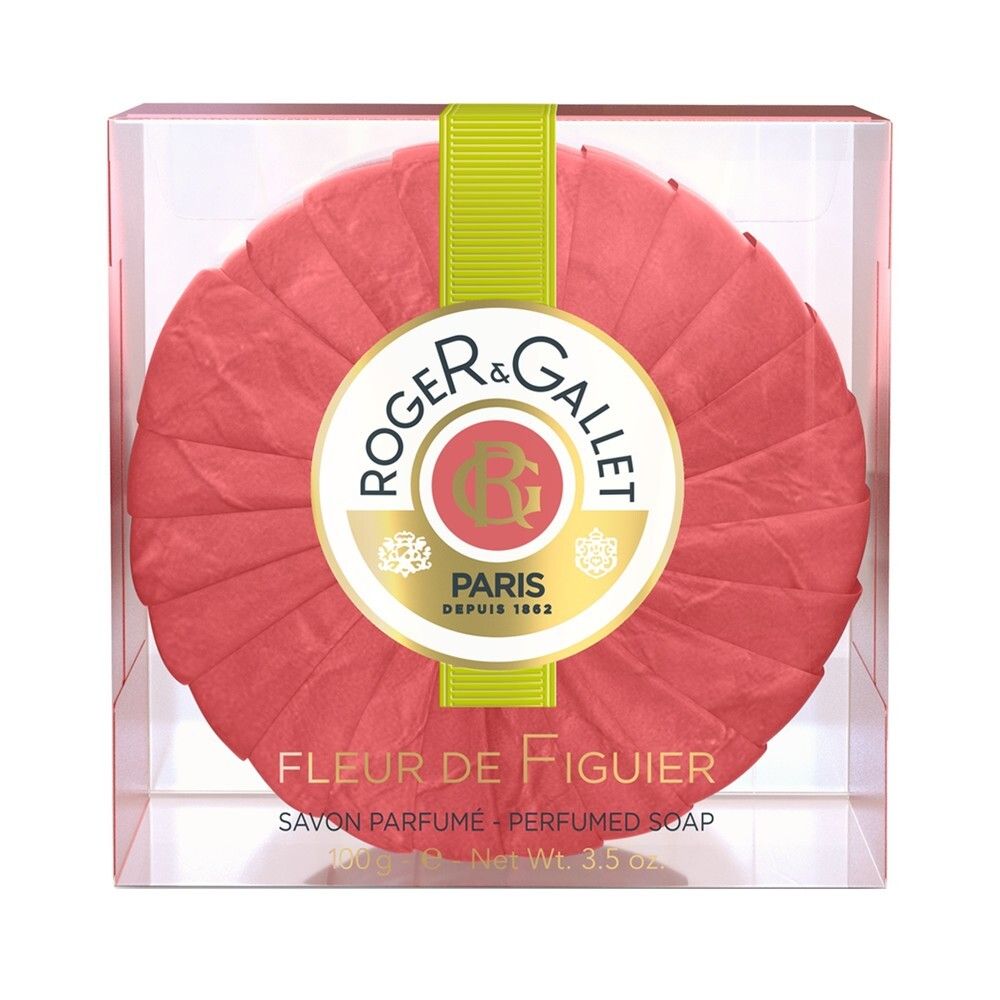 Sapone rotondo in scatola trasparente. Colore rosso, logo e scritta 'Fleur de Figuier'. Nastro verde.
