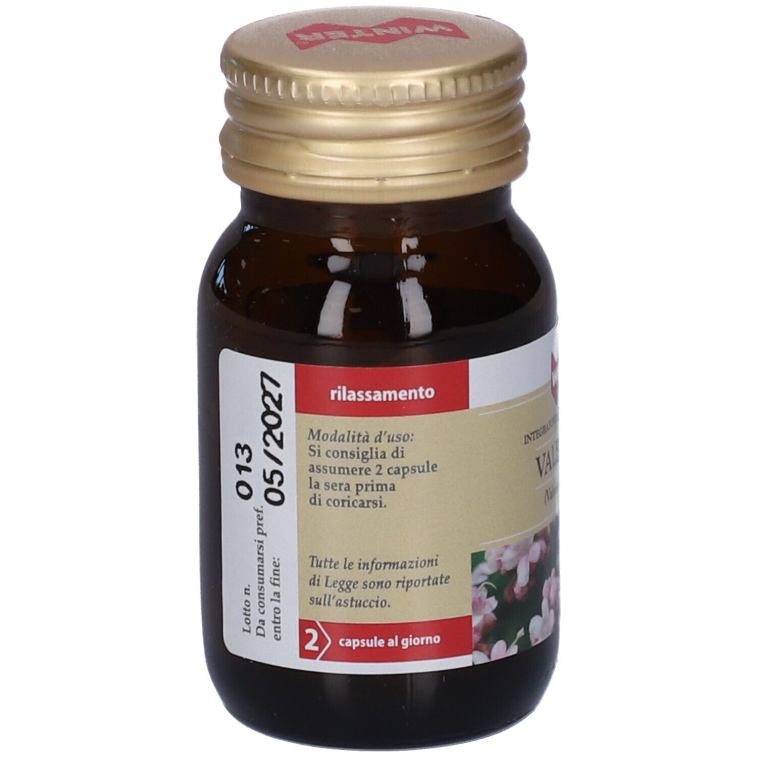 Retro del flacone di vetro marrone. Etichetta con informazioni, tra cui data di scadenza e dosaggio.