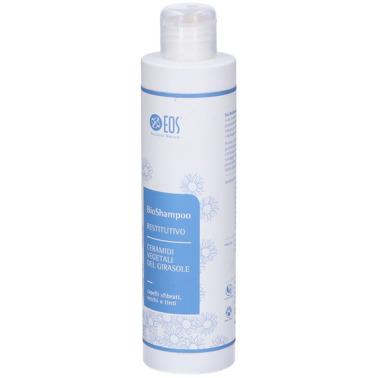 Flacone bianco con etichetta blu. Scritta: Eos, BioShampoo Restitutivo, Ceramide vegetali del girasole. Per capelli sfibrati.