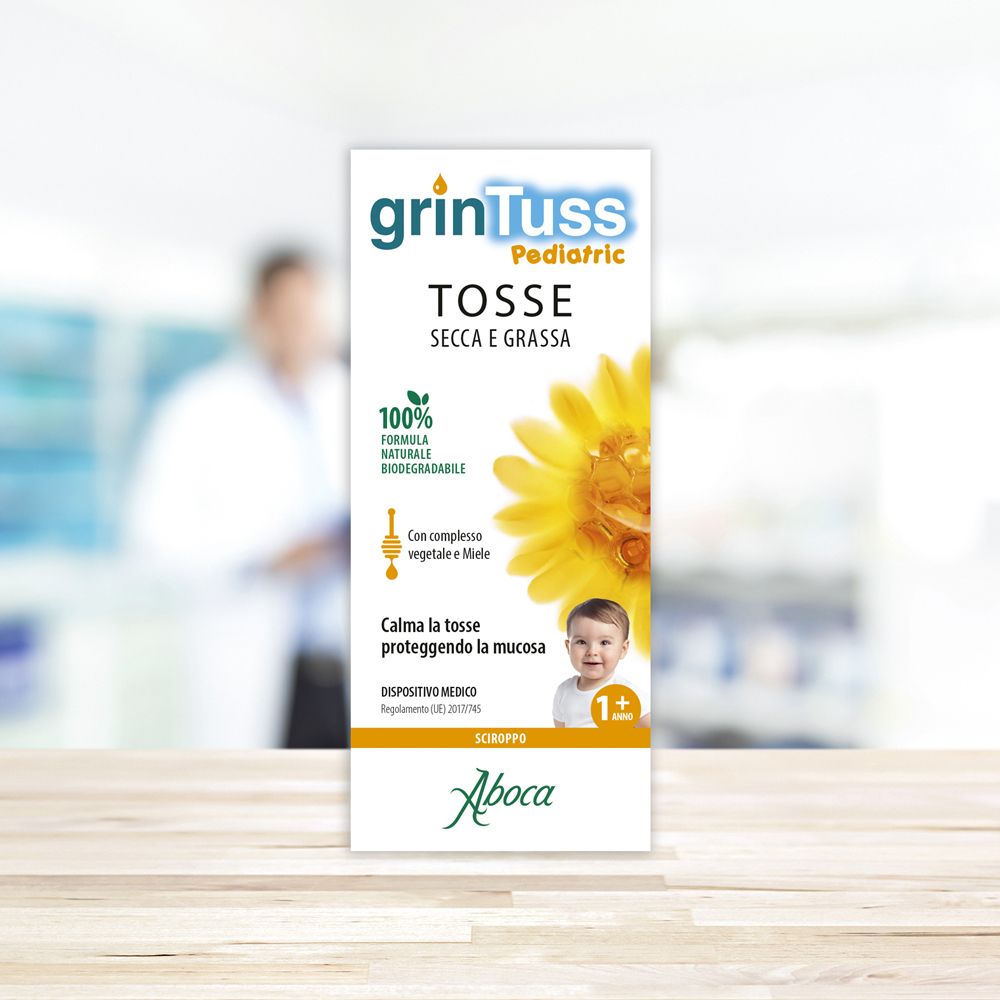 Confezione del prodotto con nome e logo. Scritto: grinTuss Pediatric, Tosse secca e grassa, 100% biodegradabile.