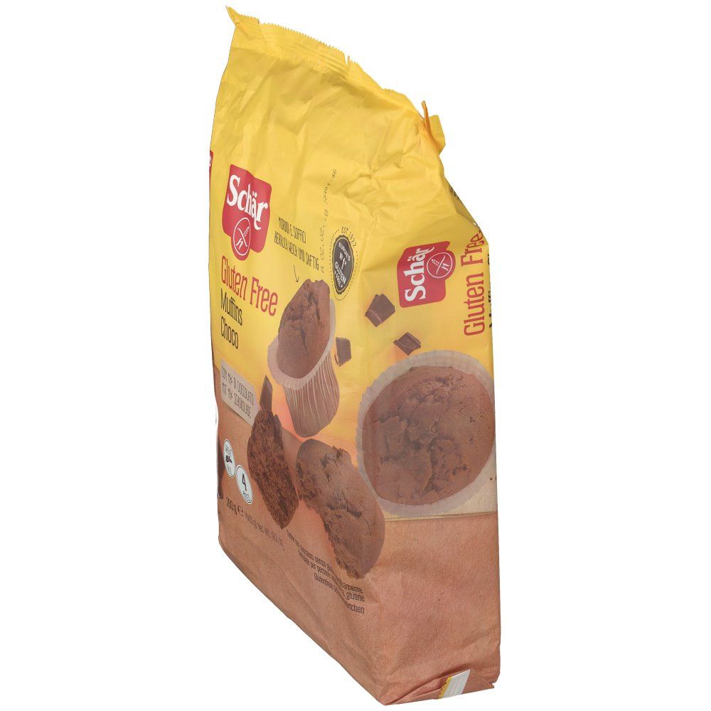 Confezione gialla Schar® Gluten Free Muffins Choco, vista laterale. Immagini di muffin. Sigillo senza glutine.
