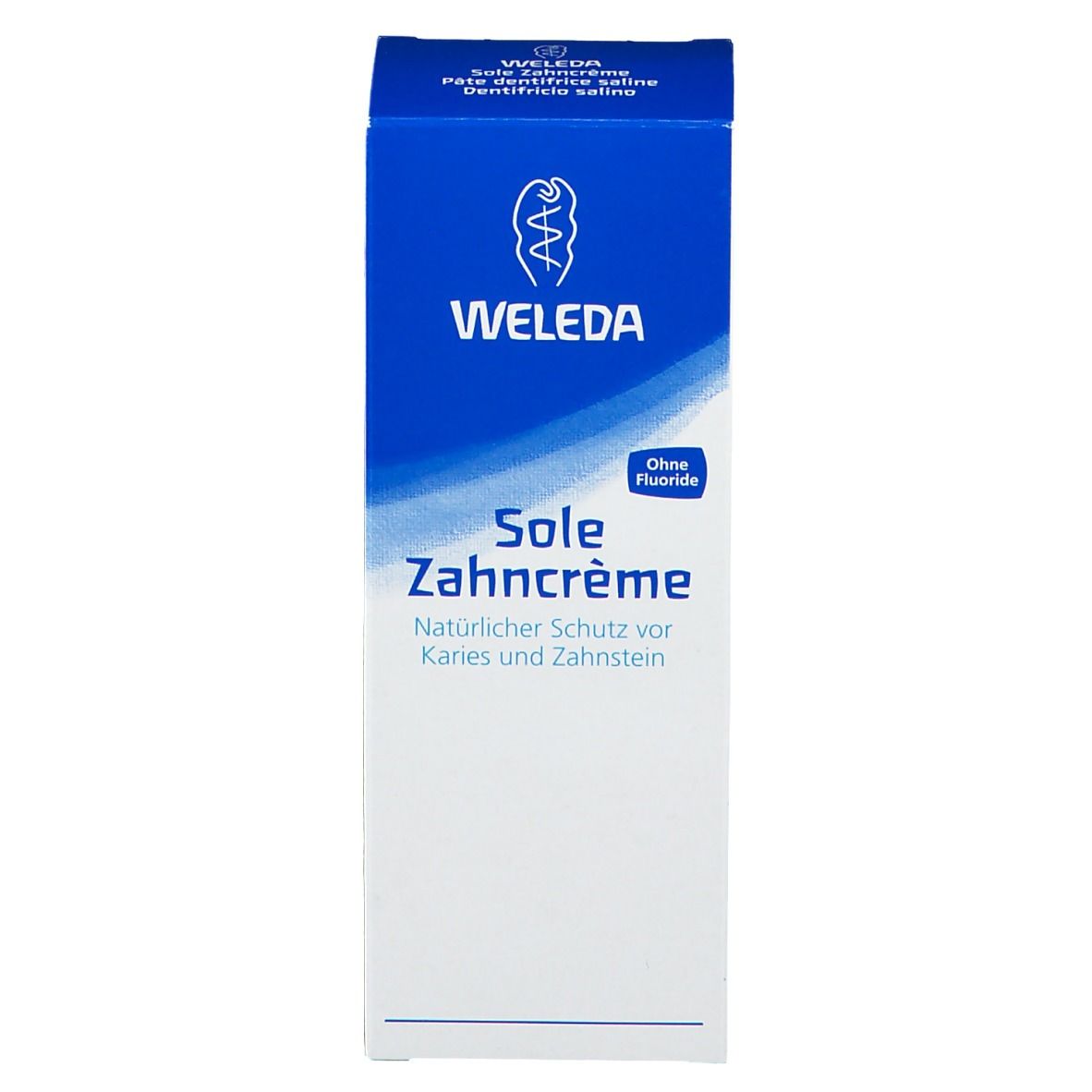 Fronte della scatola di dentifricio. Scatola blu con testo bianco. Scritte: WELEDA, Sole Zahncrème, Senza fluoro.