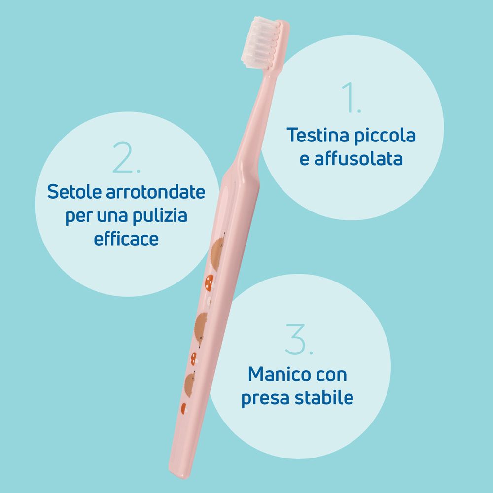 Spazzolino da denti rosa per bambini con testina piccola e setole morbide.