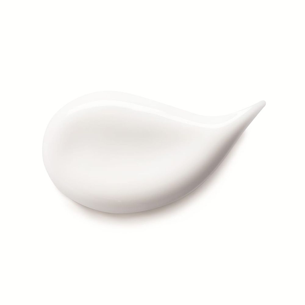 Goccia di crema bianca. Texture liscia, forma a goccia.