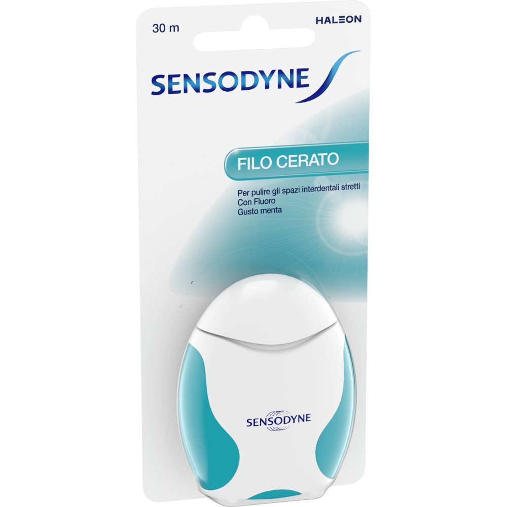 Confezione di filo interdentale. Erogatore bianco-turchese con nome del prodotto e logo del marchio. Scritta: Filo cerato, 30 m.