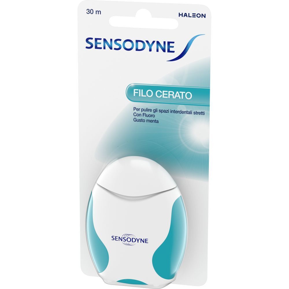 Confezione di filo interdentale. Erogatore bianco-turchese con nome del prodotto e logo del marchio. Scritta: Filo cerato, 30 m.