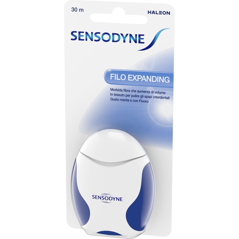Filo interdentale SENSODYNE ®. Confezione bianca e blu con immagine del prodotto e marchio. 30 m.