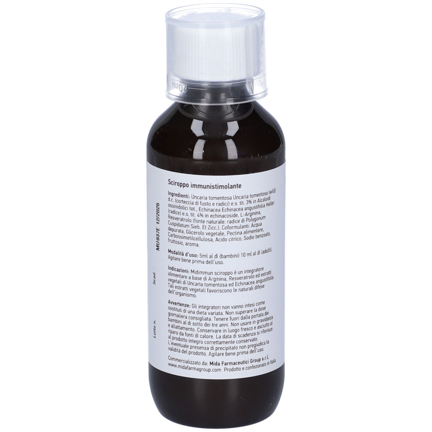 Liquido marrone in bottiglia con tappo bianco. Etichetta con ingredienti e uso.