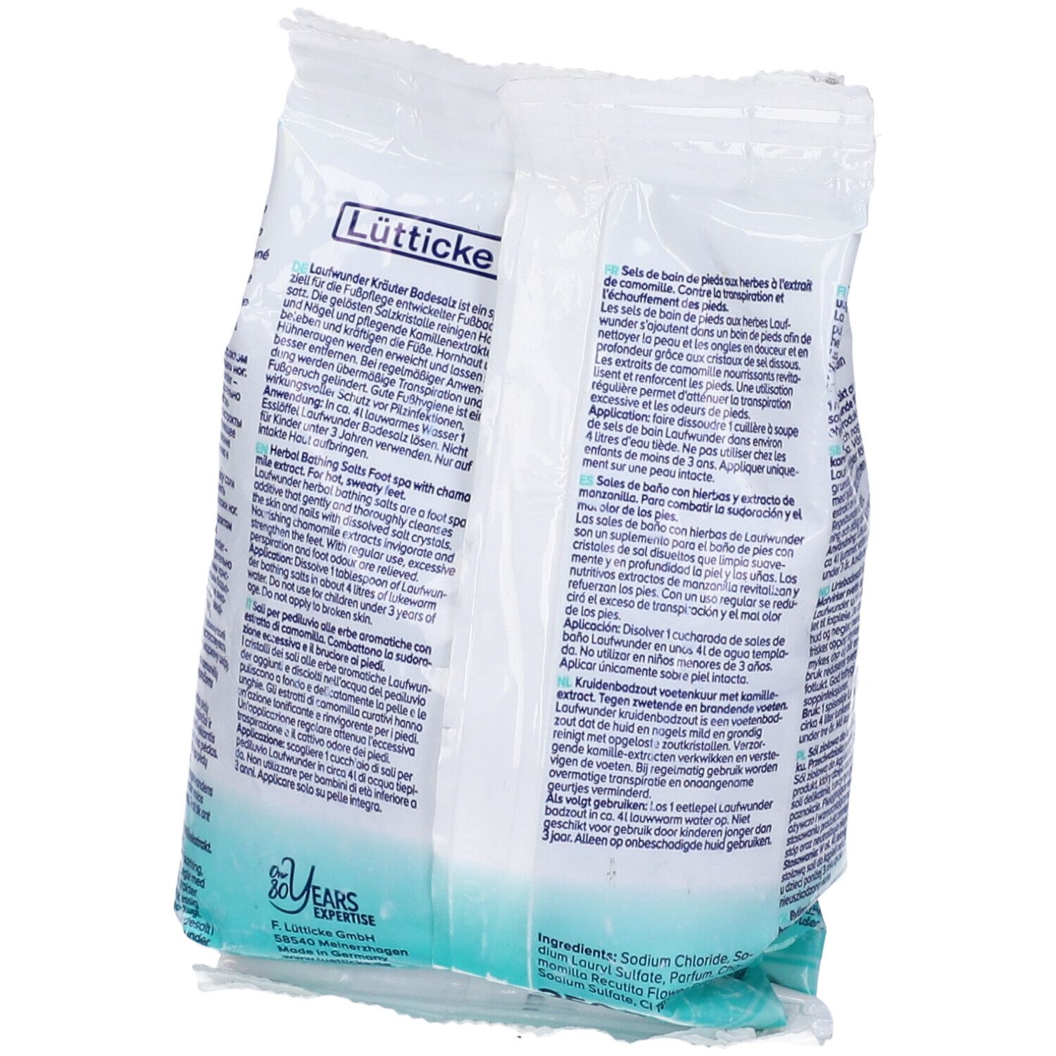Retro di una busta di sali da bagno alle erbe. Testo multilingue. Logo: 20 anni di esperienza.