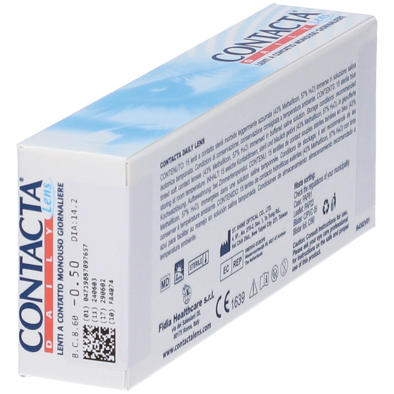 Scatola di lenti inclinata, retro. Testo, informazioni produttore, marchio CE, numero di lotto.